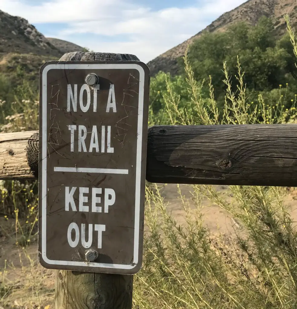 Keep out trail sign